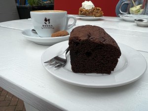 A brownie and cup of coffee